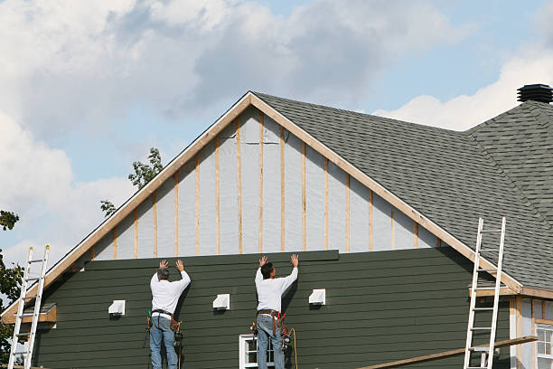 Professional Siding Installation technician working in Ashland, OR